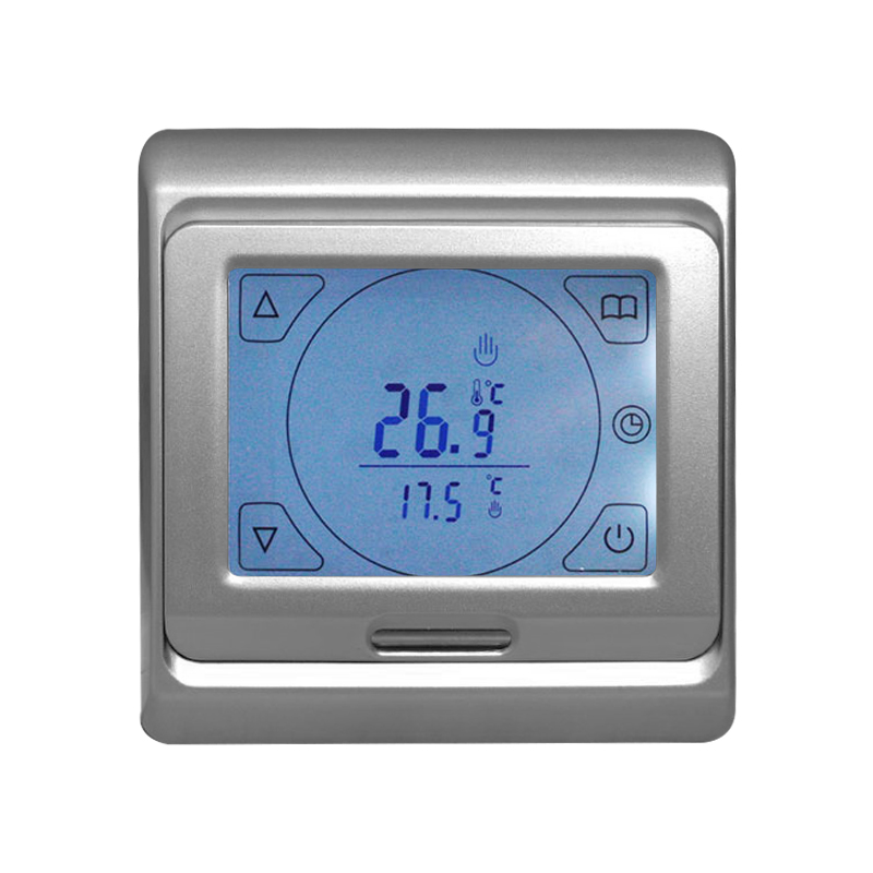 Silberner digitaler Thermostat mit blauem Display, das 26.9 Grad Celsius anzeigt.