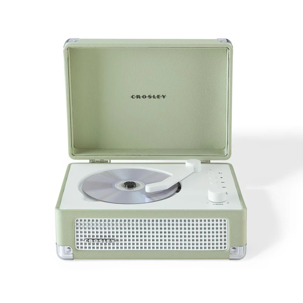 Ein offener, mintgrüner Crosley-Plattenspieler im Retro-Design mit einer silbernen Schallplatte und weißem Tonarm.