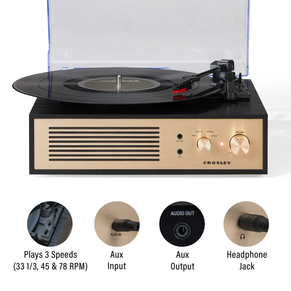 Ein schwarzer Crosley Plattenspieler mit goldener Front, einer Schallplatte und vier Funktionssymbolen.