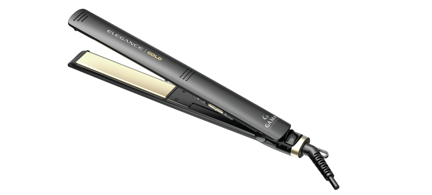 Piastra per capelli nera con placche dorate su sfondo bianco.