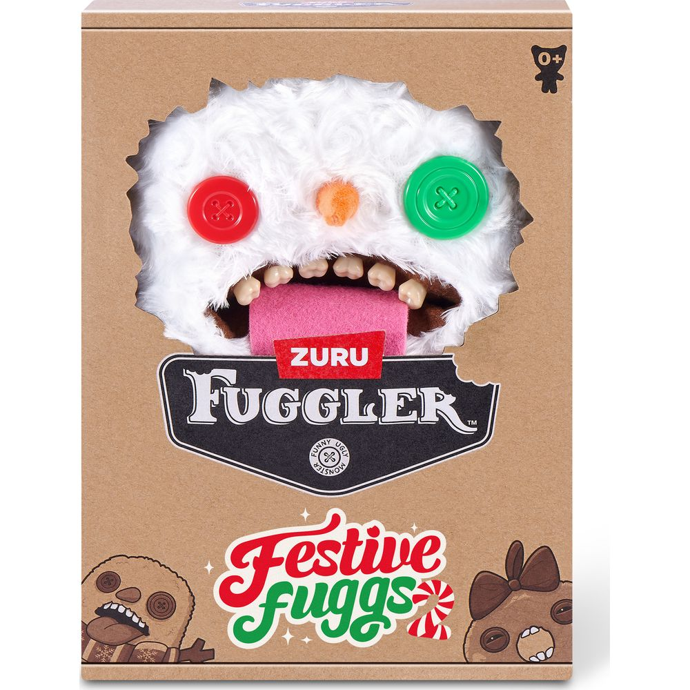Weißer Fuggler-Plüschmonster in brauner Kartonverpackung mit roten und grünen Knochenaugen.