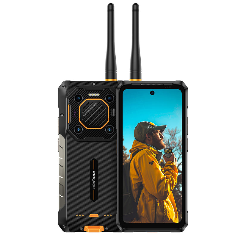 Smartphone resistente negro y amarillo con dos antenas y pantalla que muestra a un hombre con chaqueta amarilla.