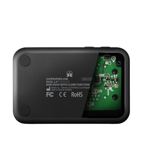 Mini dock USB noir partiellement ouvert, révélant la carte circuit verte.