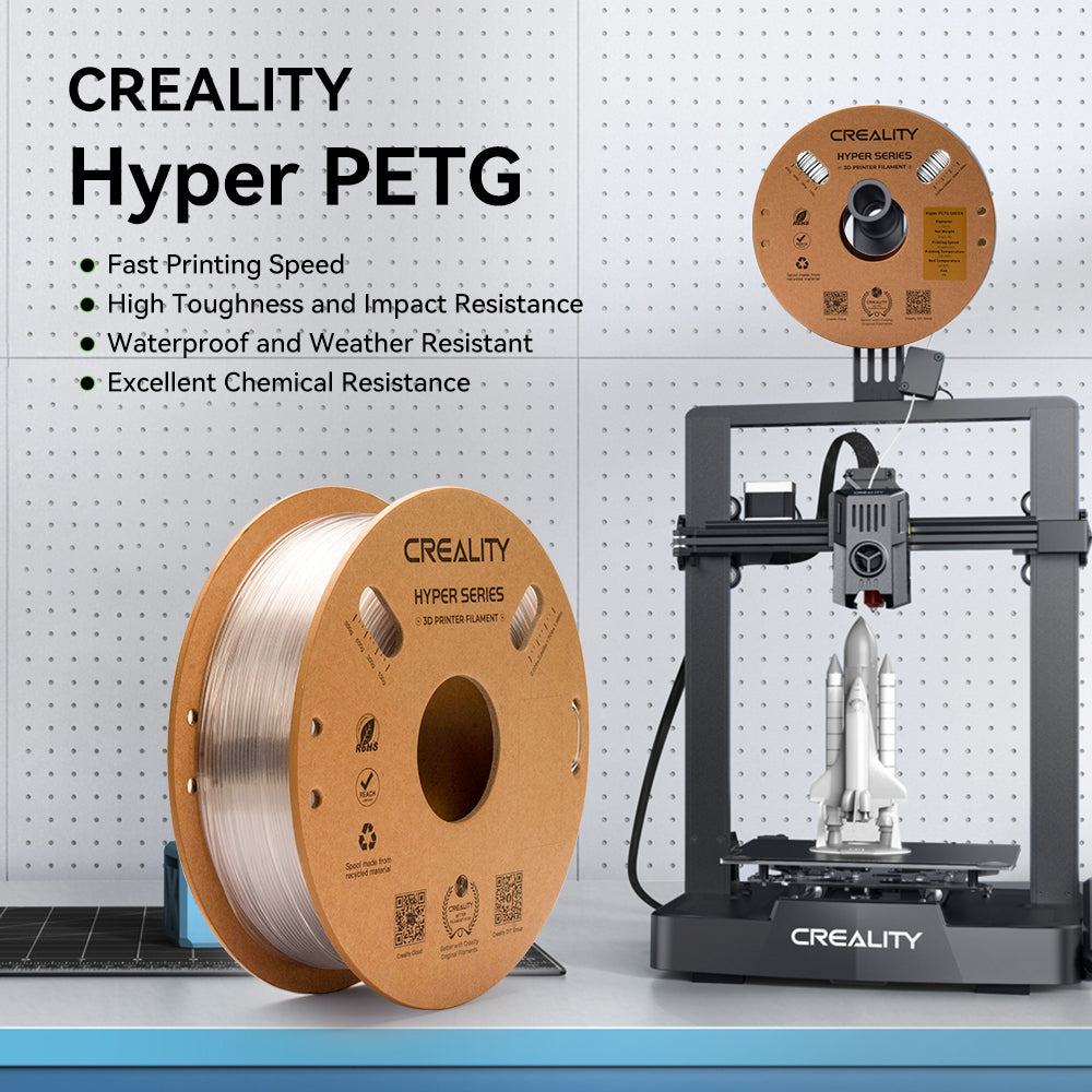 Bobinas de filamento Creality Hyper PETG junto a una impresora 3D con un transbordador.