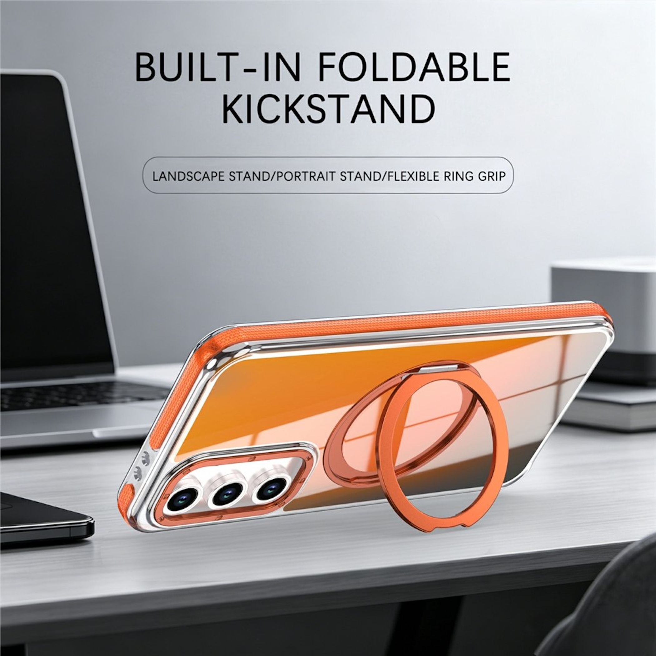 Ein Smartphone in einer orange-transparenten Hülle mit klappbarem Ring auf einem Schreibtisch.