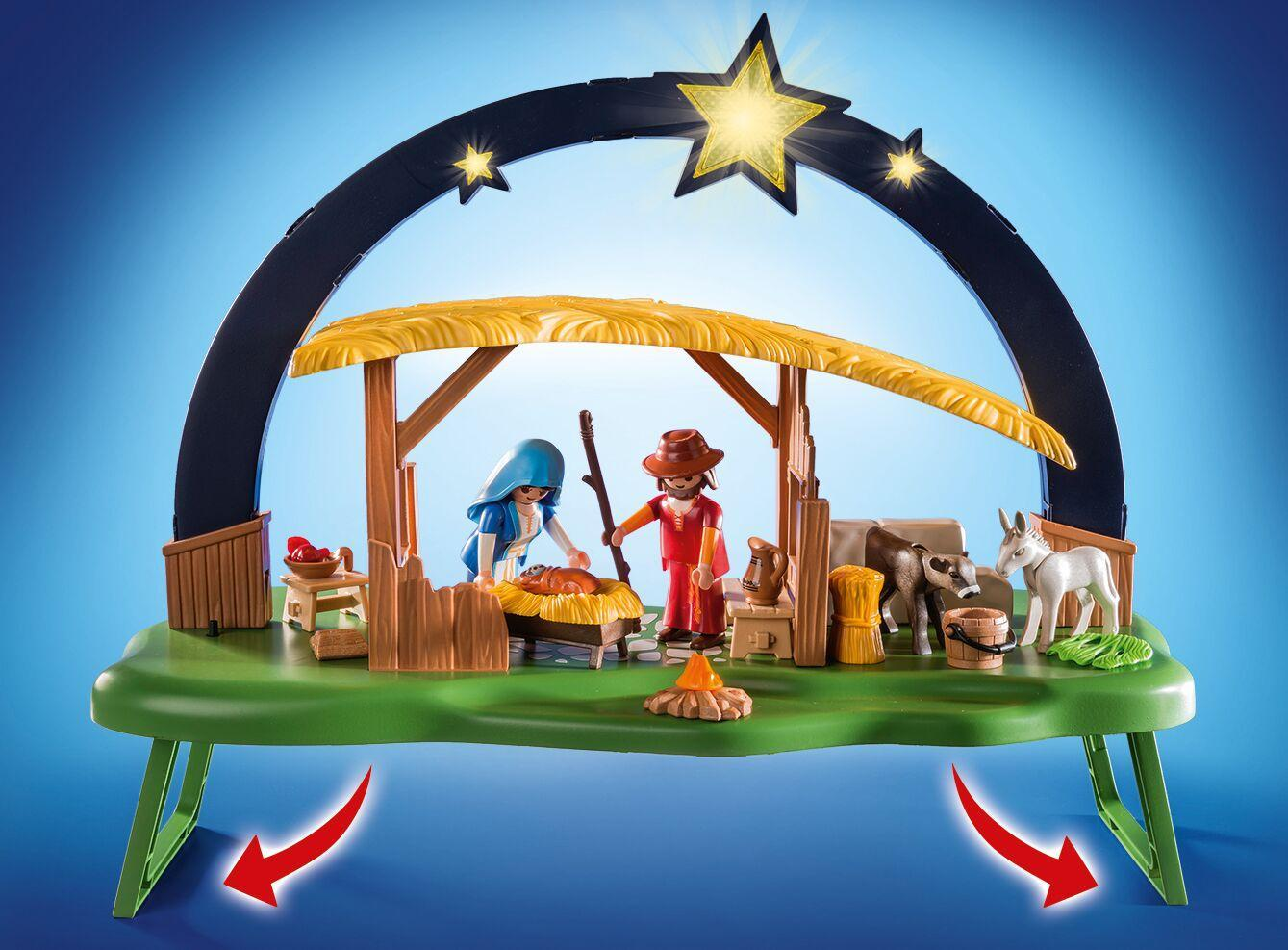 Belén de Playmobil con establo, María, José, el niño Jesús, animales y arco con estrellas brillantes.