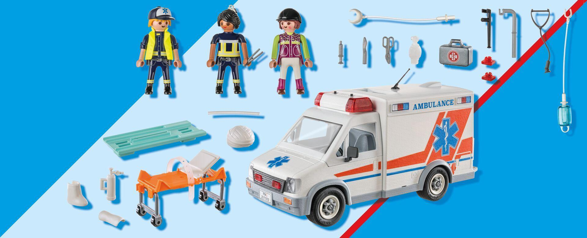 Juguete de ambulancia Playmobil con figuras de paramédicos, camilla, herramientas médicas y accesorios sobre fondo azul.
