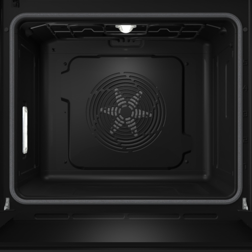 L'interno di un forno nero con una griglia di ventilazione rotonda e una luce da soffitto accesa.