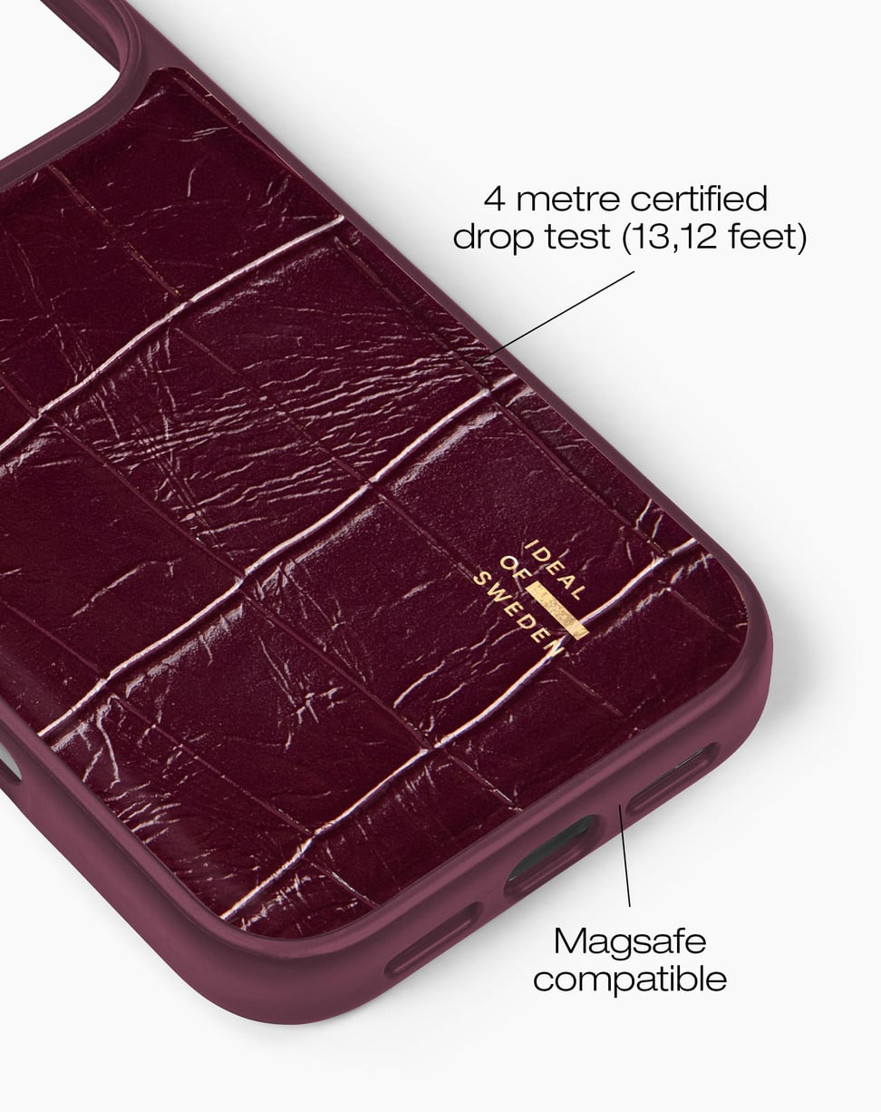 Cover per telefono bordeaux coccodrillo con testo informativo.