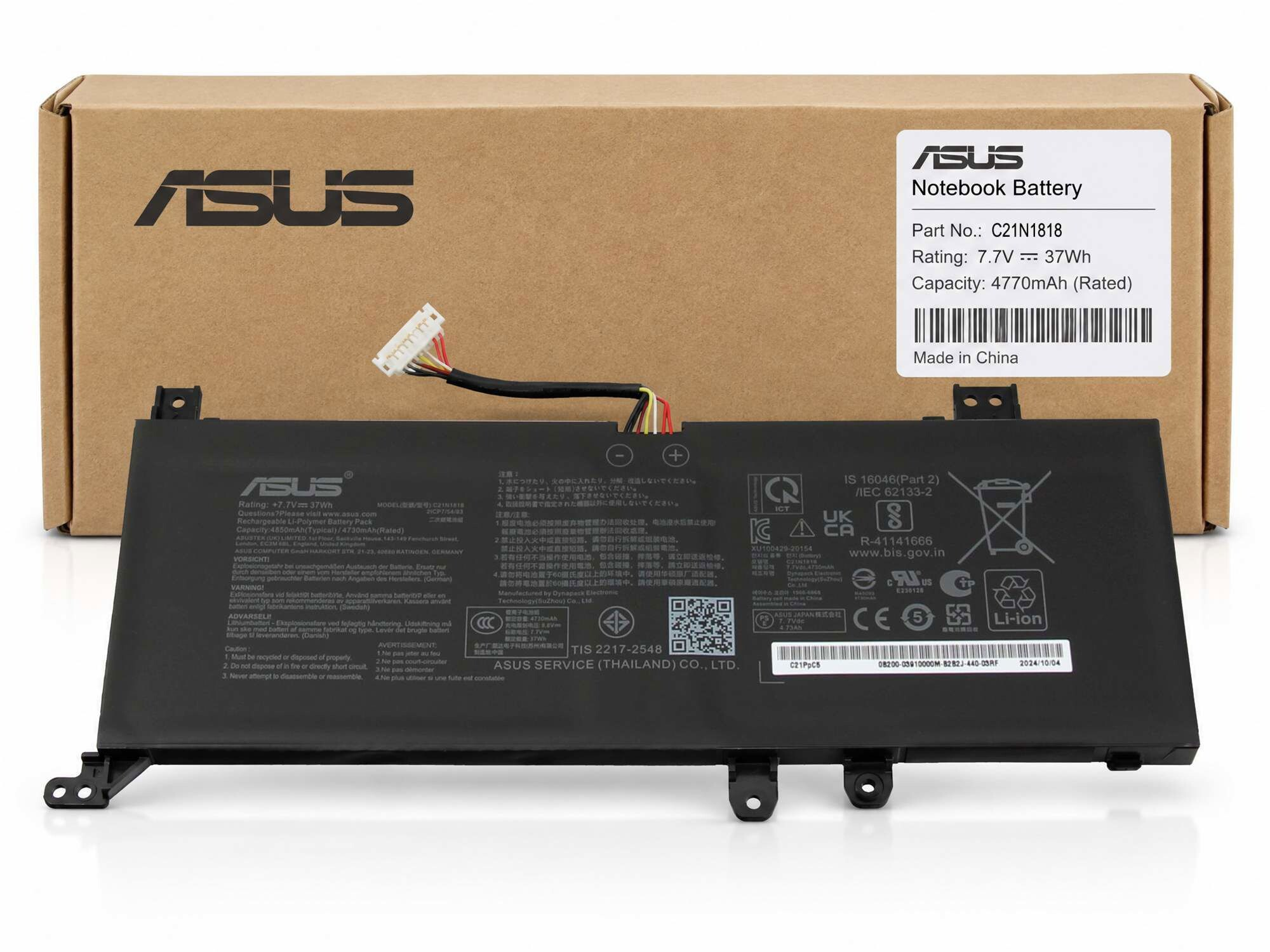 Ein ASUS Notebook-Akku liegt vor einer Pappschachtel mit ASUS-Logo und technischen Daten.