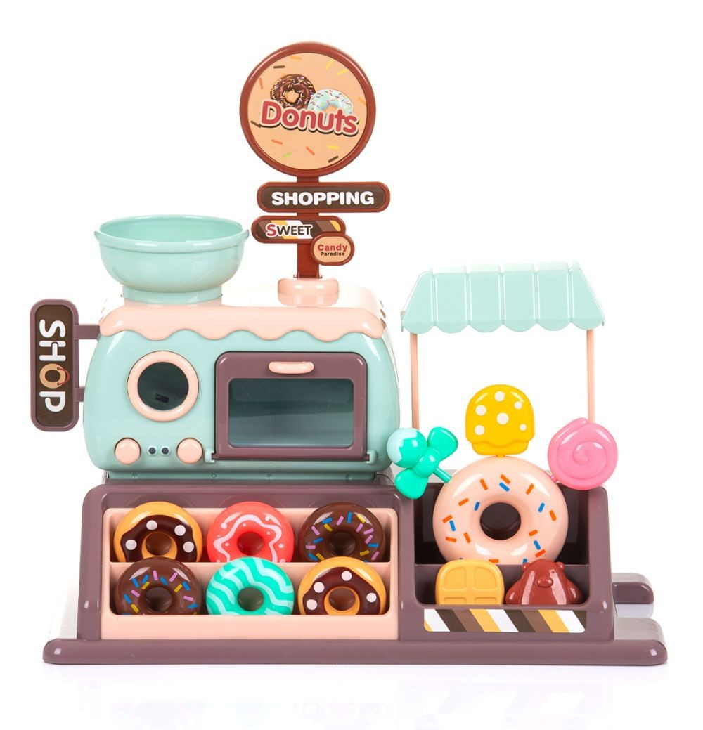 Buntes Kunststoff-Donut-Shop-Spielset mit Ofen, Regalen und verschiedenen Spielzeugsüßigkeiten gegen weißen Hintergrund.