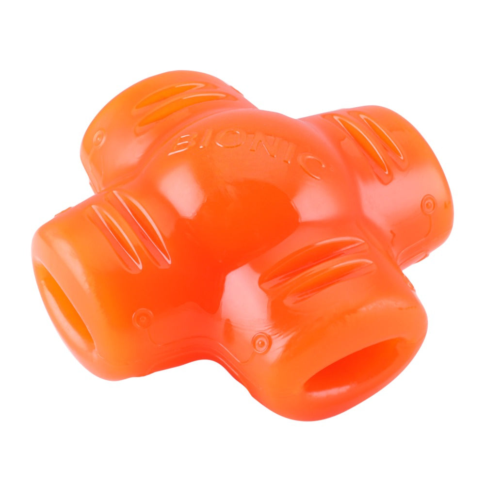 Un juguete de goma naranja para perros en forma de cruz con crestas texturizadas y la marca Bionic.