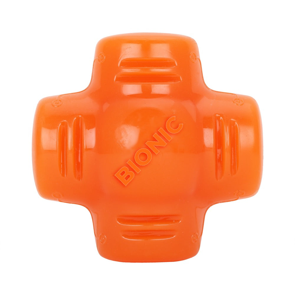 Un juguete para perros Bionic naranja en forma de cruz con agarres texturizados sobre fondo blanco.