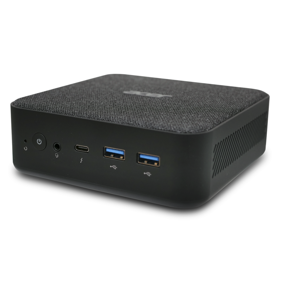 Schwarzer Mini-PC mit Stoffoberfläche und Frontanschlüssen wie USB, Type-C und Power-Taste.