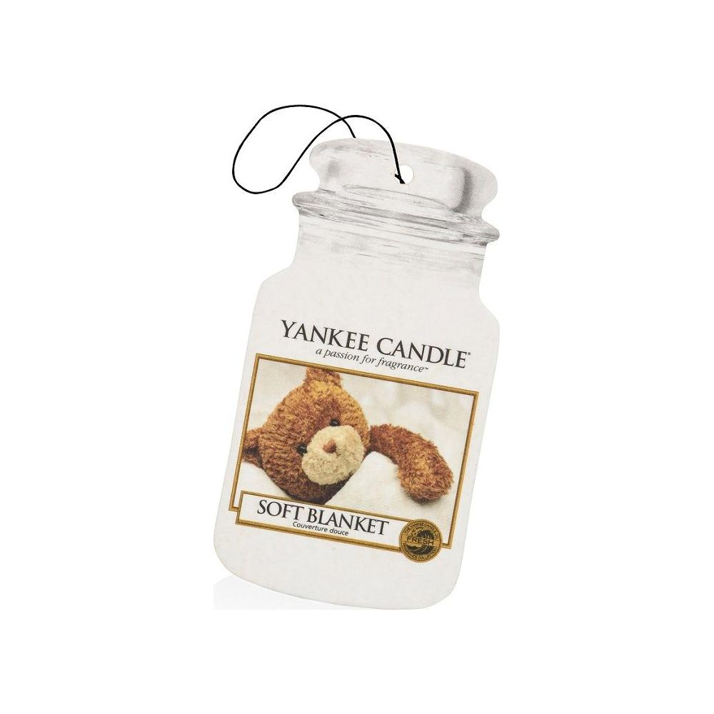 Ein Yankee Candle Soft Blanket Auto-Lufterfrischer mit einem Teddybär-Bild.