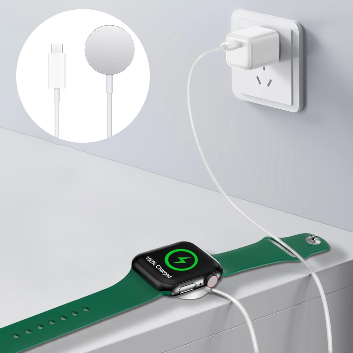 Eine grüne Smartwatch lädt mit weißem Ladekabel an einer Steckdose.