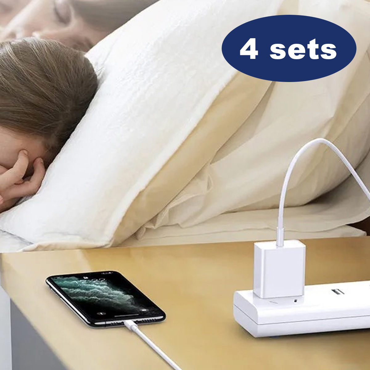 Ein Telefon lädt auf einem Nachttisch, verbunden mit einer weißen Steckdosenleiste.