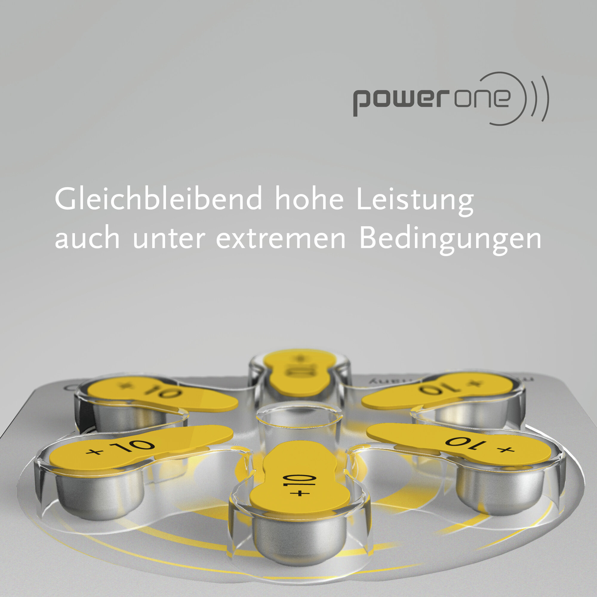 Power-one Batteriedispensierer mit gelben Laschen auf grauem Hintergrund.