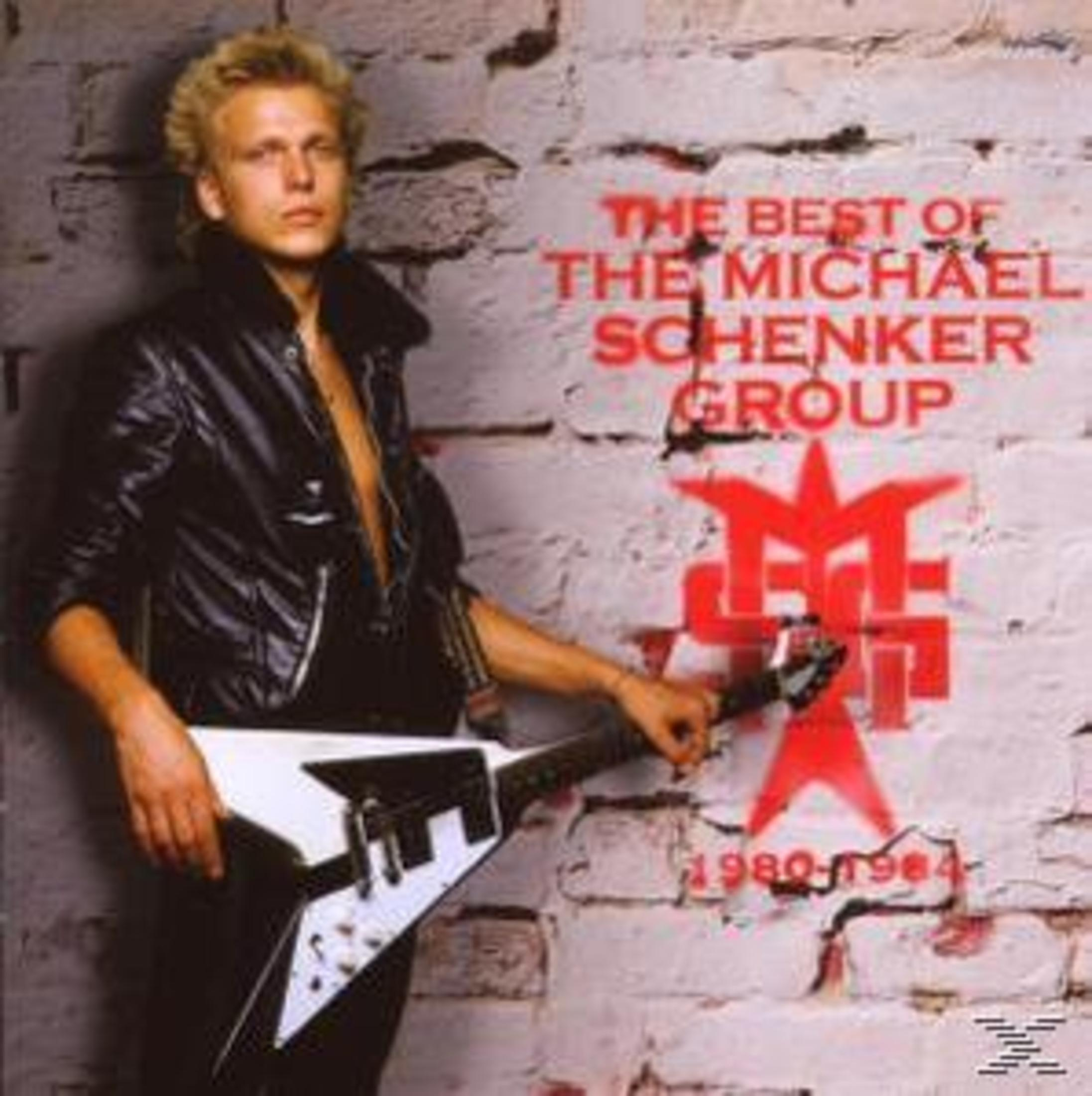 Michael Schenker mit V-Gitarre vor einer Backsteinwand mit rotem Logo.