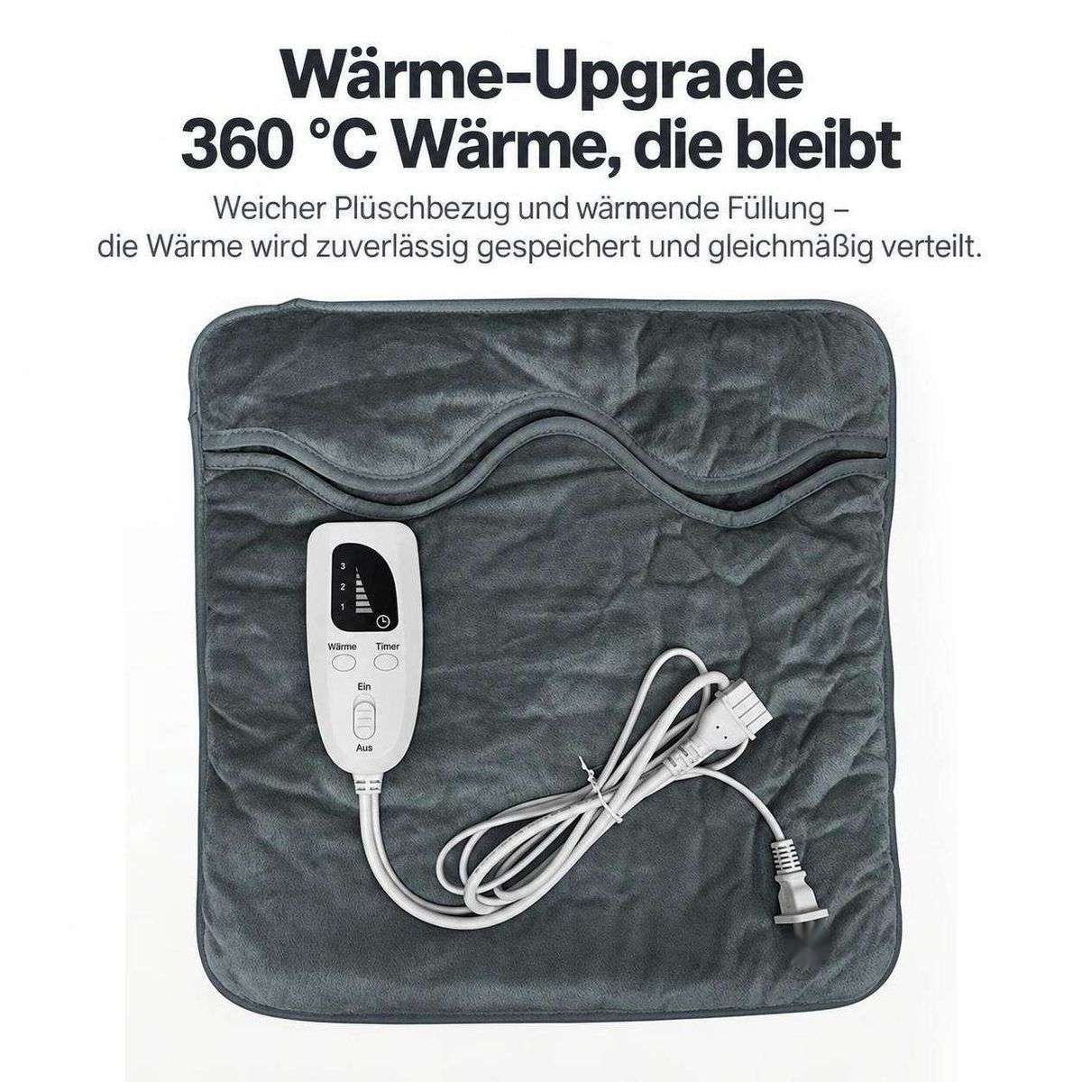 Graues, weiches Heizkissen mit Bedienelement und Kabel auf hellem Hintergrund.