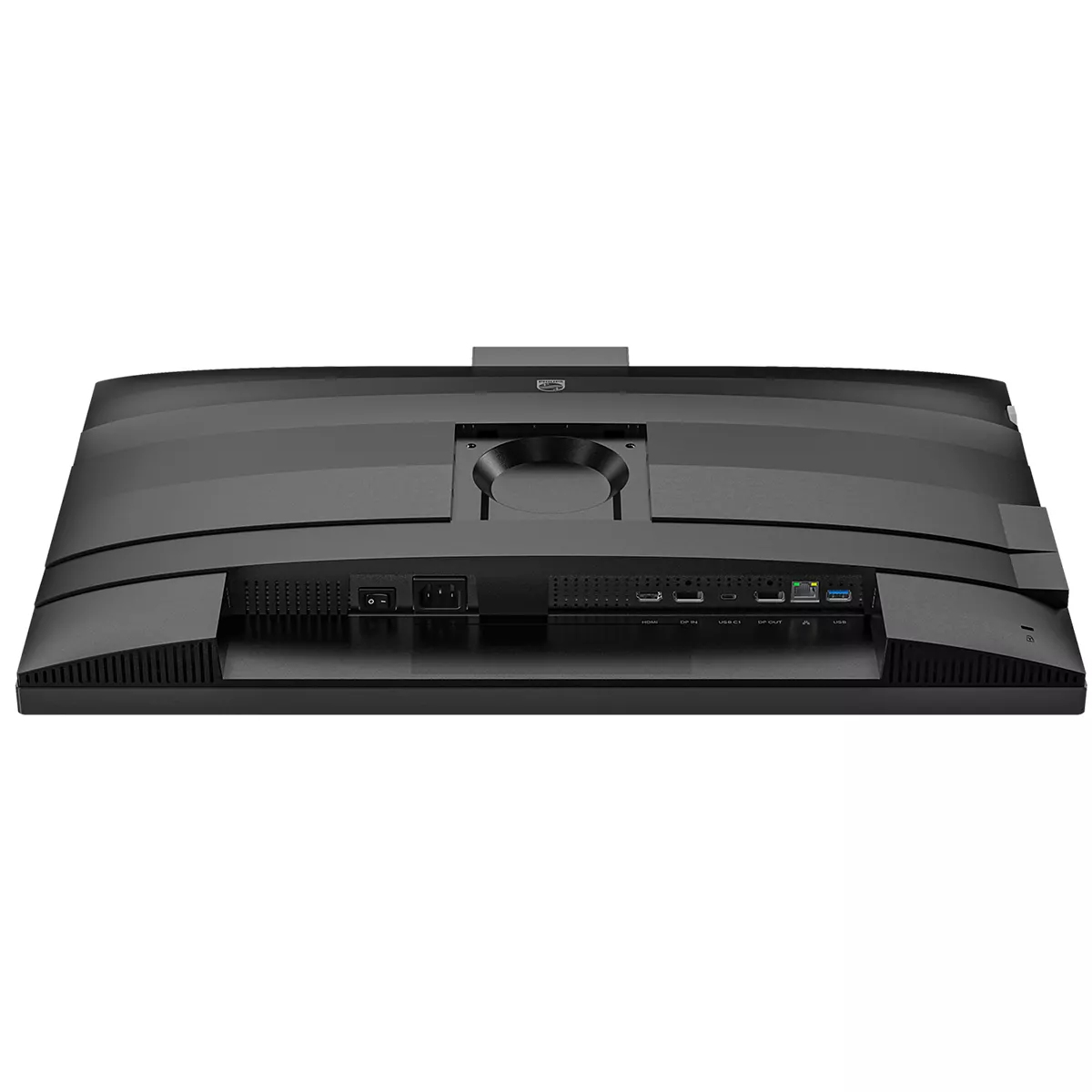 Vista posteriore di un monitor nero con interruttore, presa di corrente e varie porte di connessione su sfondo bianco.