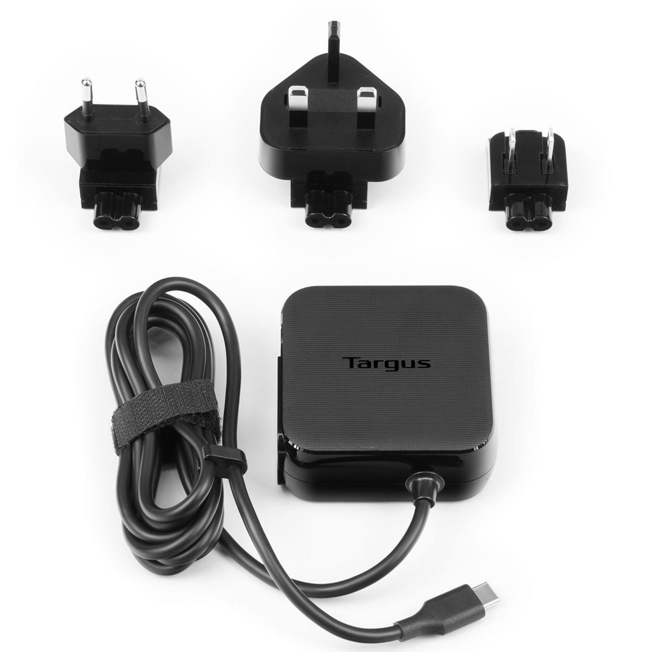 Adaptateur secteur Targus noir avec câble et trois adaptateurs de prise différents sur fond blanc.