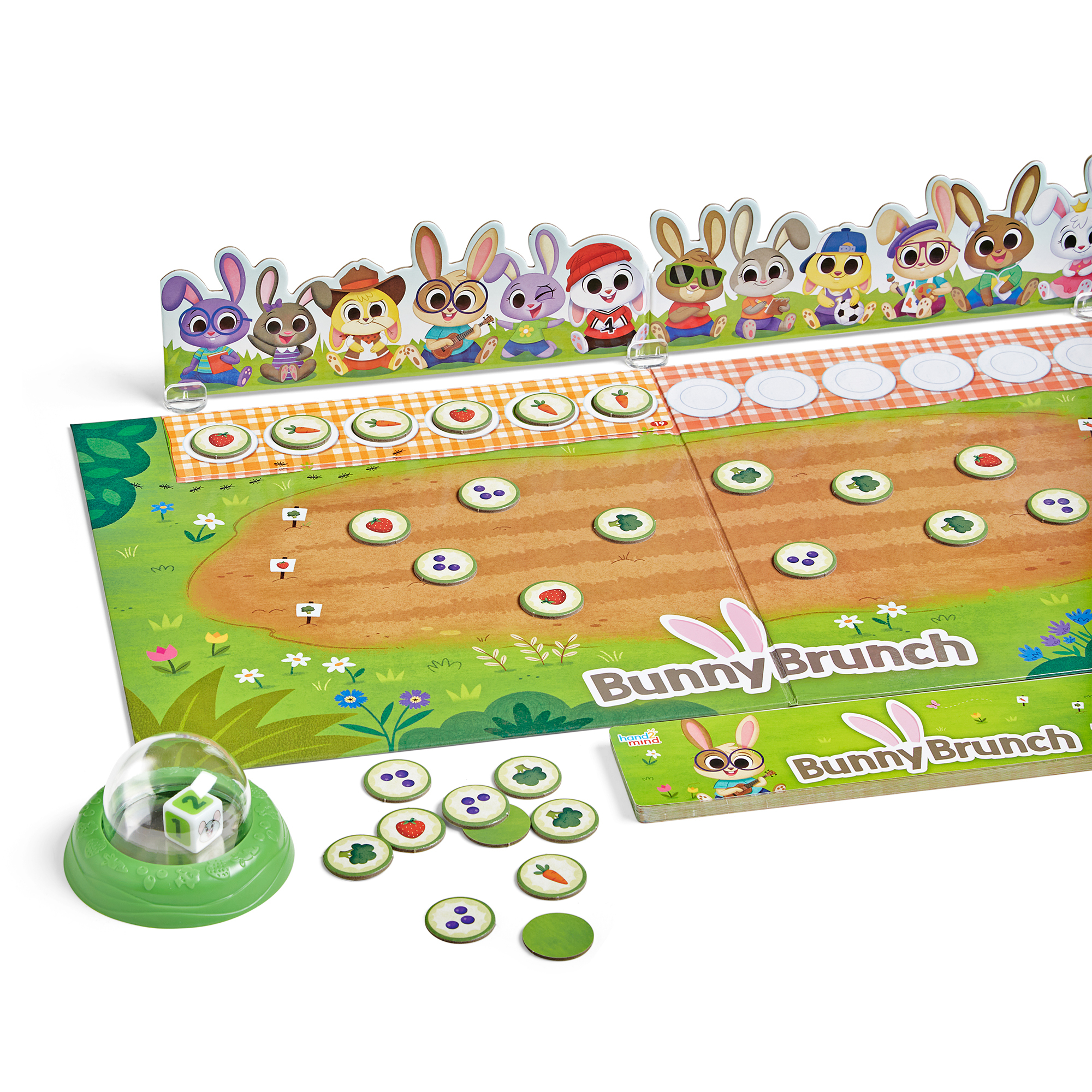 Bunny Brunch Brettspiel mit bunten Hasenfiguren, Gartenfeld, Markern und einer grünen Würfelkuppel.