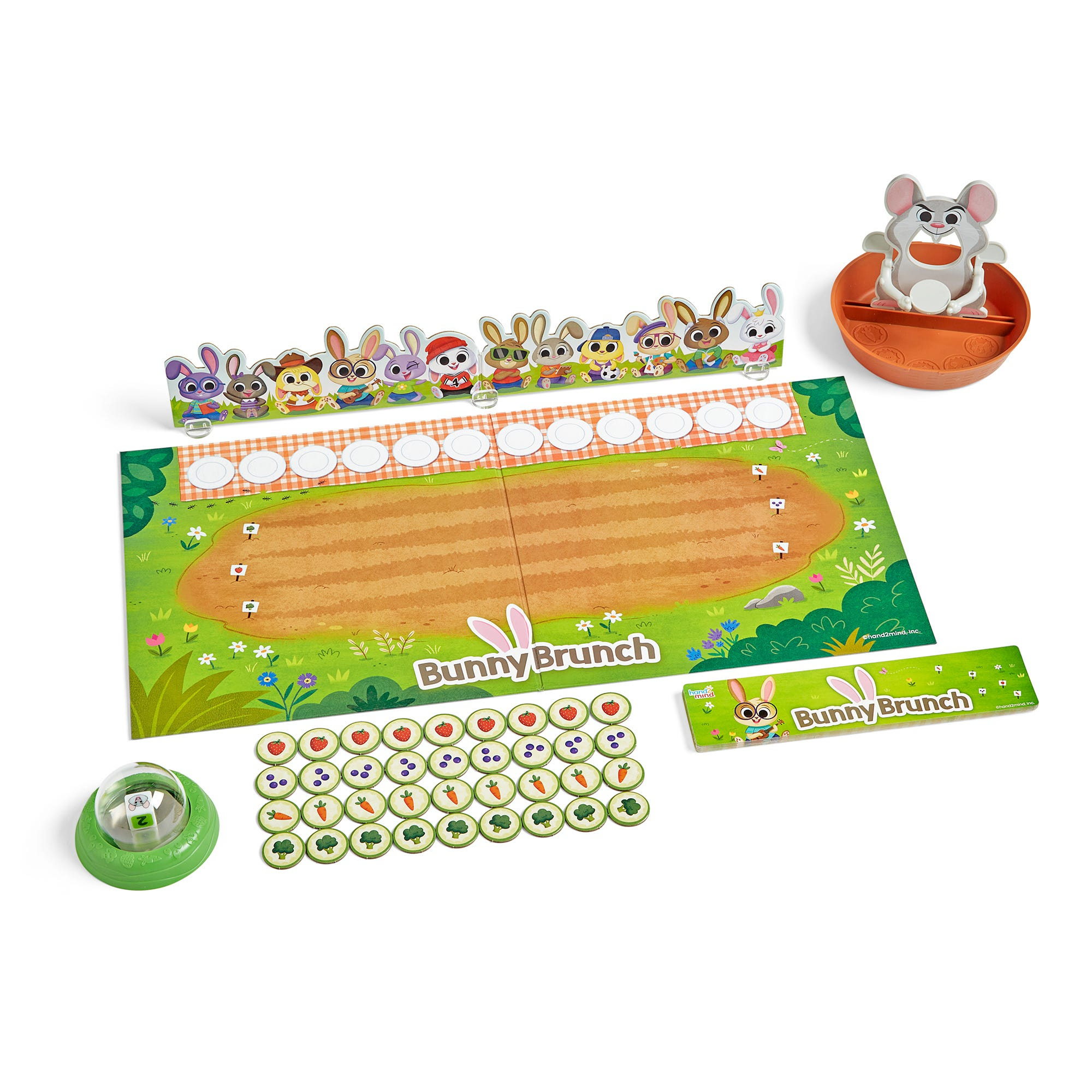 Das Brettspiel Bunny Brunch mit bunten Hasenfiguren, einer Spielmatte, runden Spielsteinen und einer Maisschüssel.