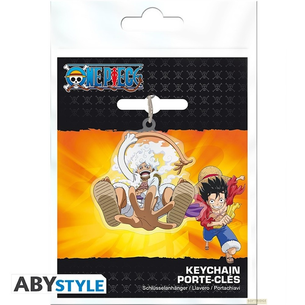 Llavero de One Piece en embalaje con Luffy en Gear 5 y forma estándar sobre fondo naranja y negro.