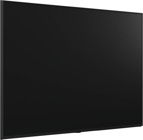 Una grande TV a schermo piatto nera con una cornice sottile su una superficie luminosa su sfondo bianco.