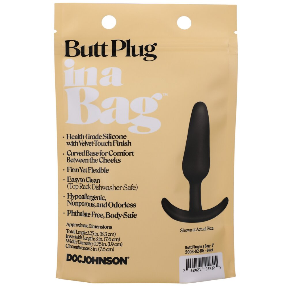 Beige Verpackung eines schwarzen Silikon-Buttplugs mit Produktbeschreibung.