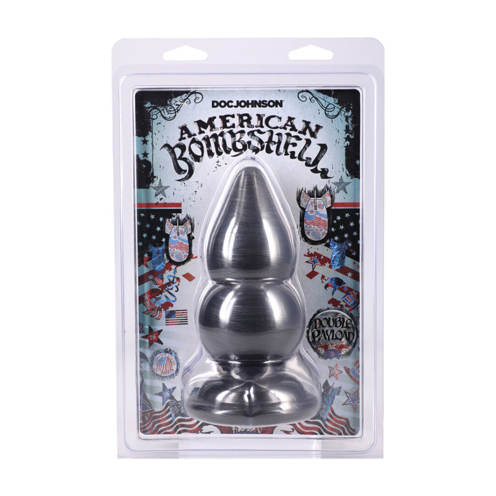 Ein silberner, dreistufiger Butt-Plug in Originalverpackung mit US-Flaggen-Muster und der Aufschrift American Bombshell.