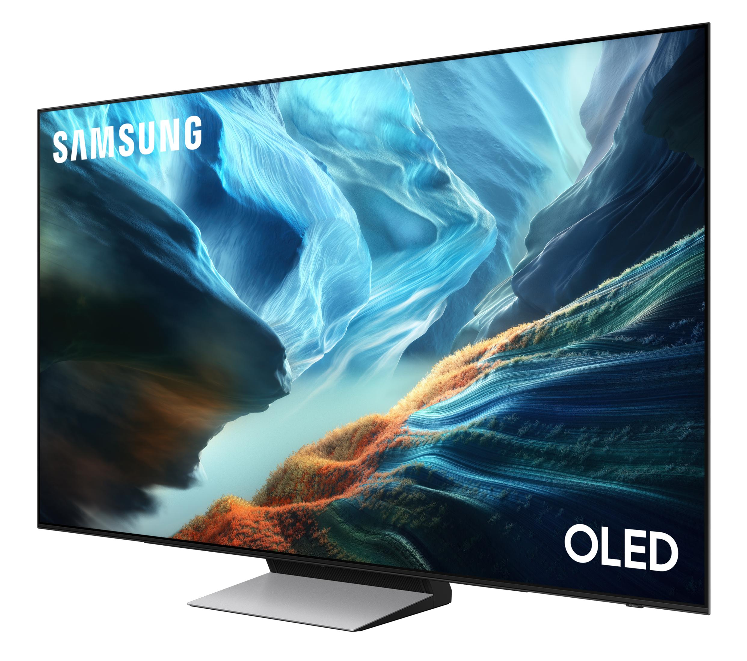 Telewizor Samsung OLED wyświetlający kolorowy krajobraz górski, ze srebrną podstawą.