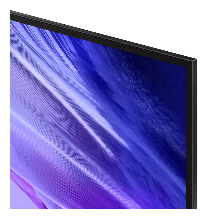 Primo piano dell'angolo di una TV con un motivo astratto blu sullo schermo e una sottile cornice nera.