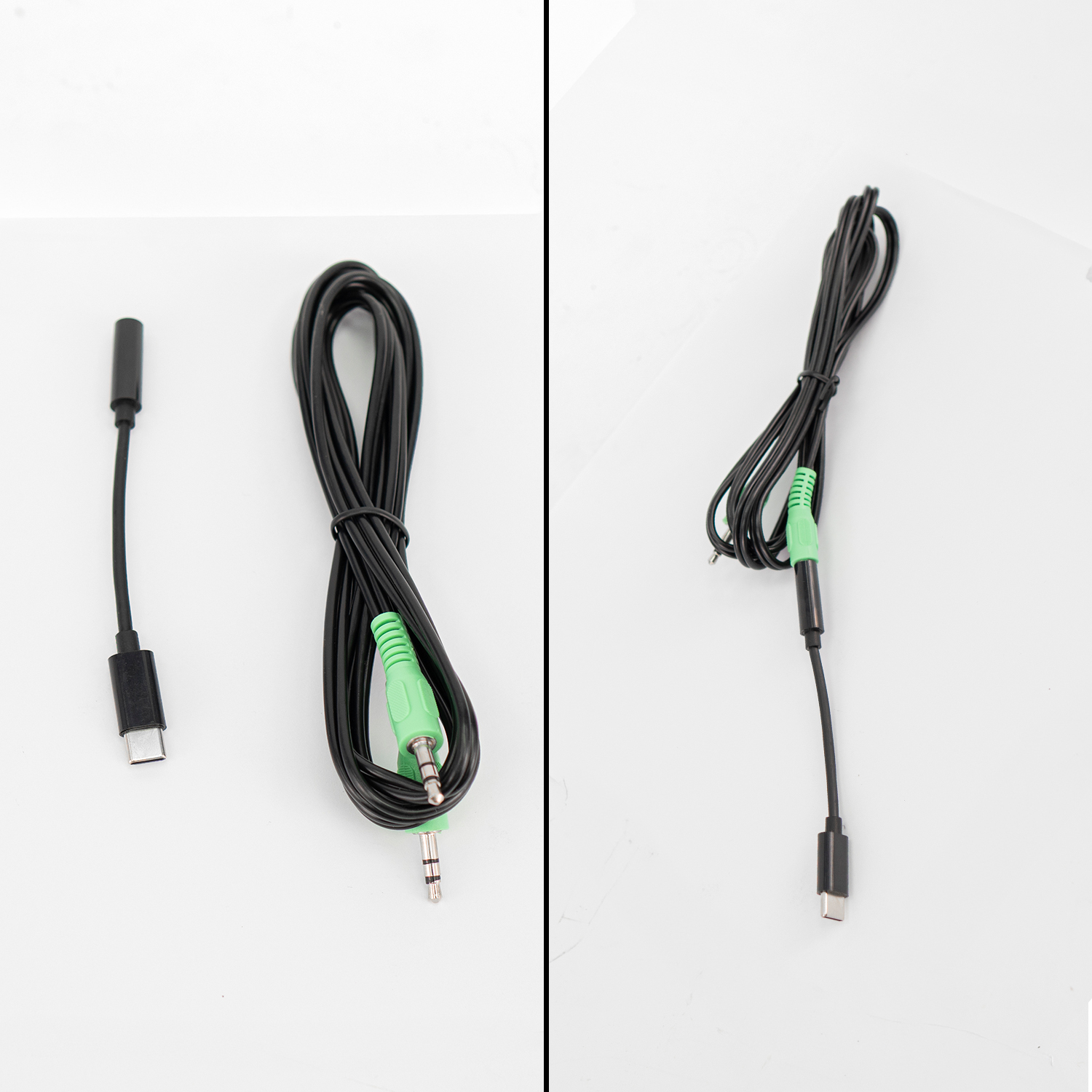 Un cavo nero da USB-C a jack audio e un adattatore su una superficie bianca.
