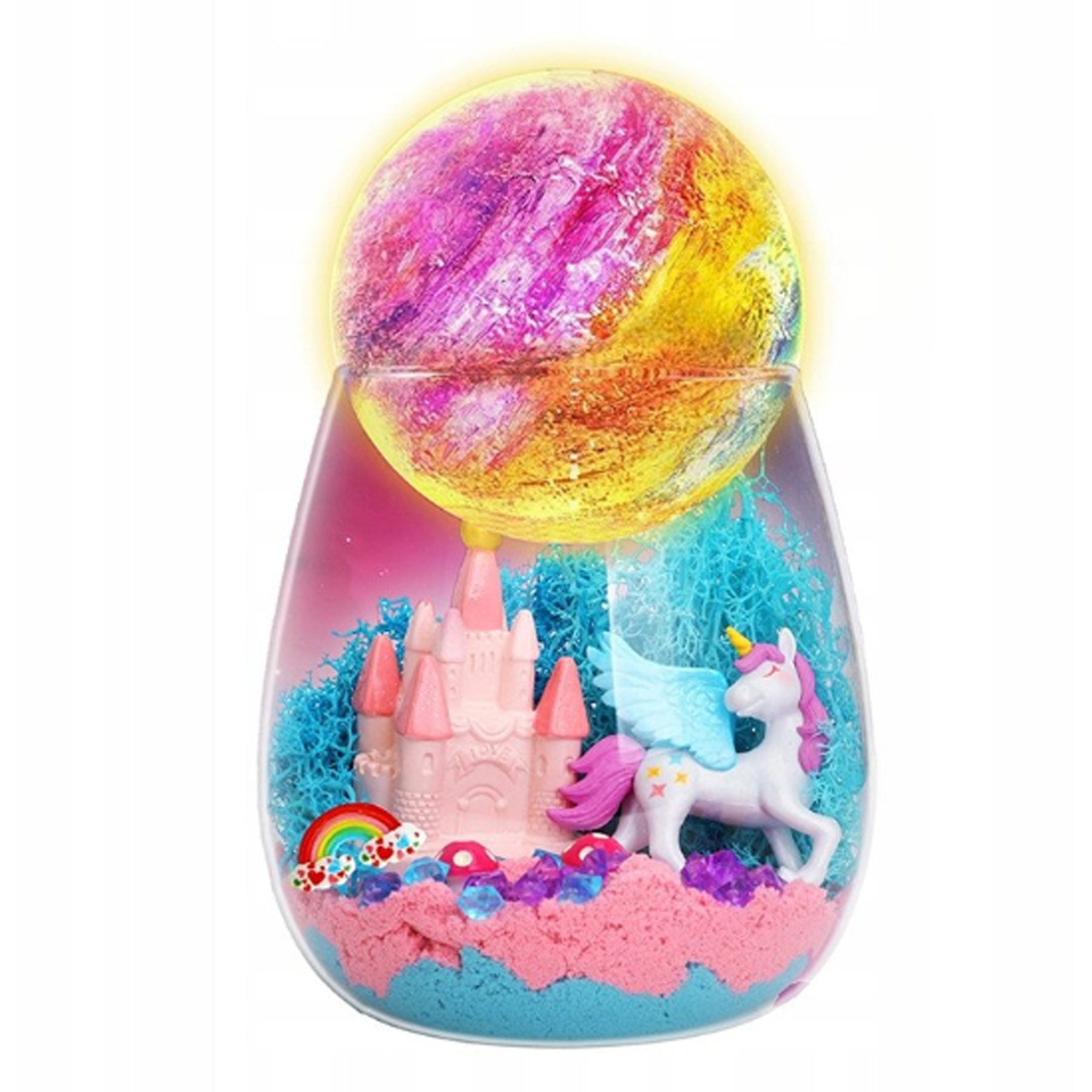 Szklane terrarium z różowym zamkiem, jednorożcem, tęczą i świecącą kulą księżycową.