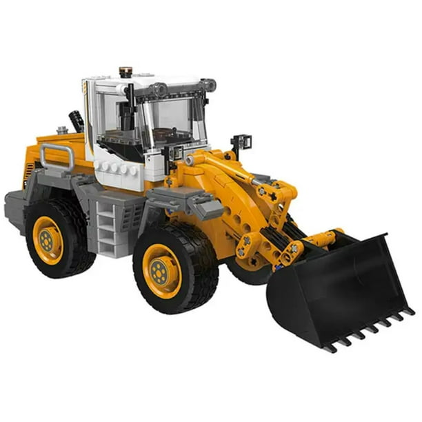 Żółto-biała ładowarka kołowa LEGO z dużą czarną łyżwą.