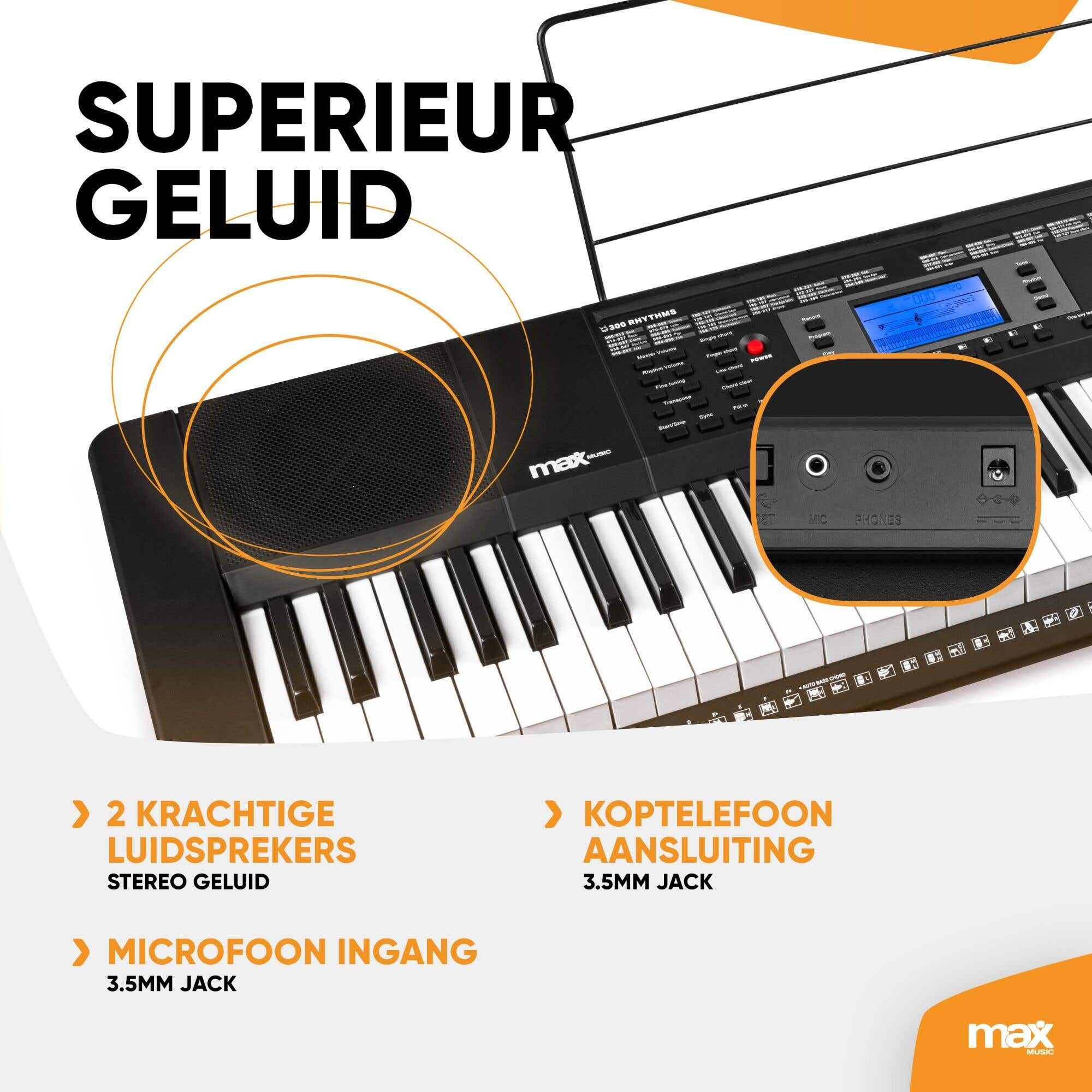 Un teclado Max Music con altavoces integrados y conectores de 3.5 mm para micrófono y auriculares.
