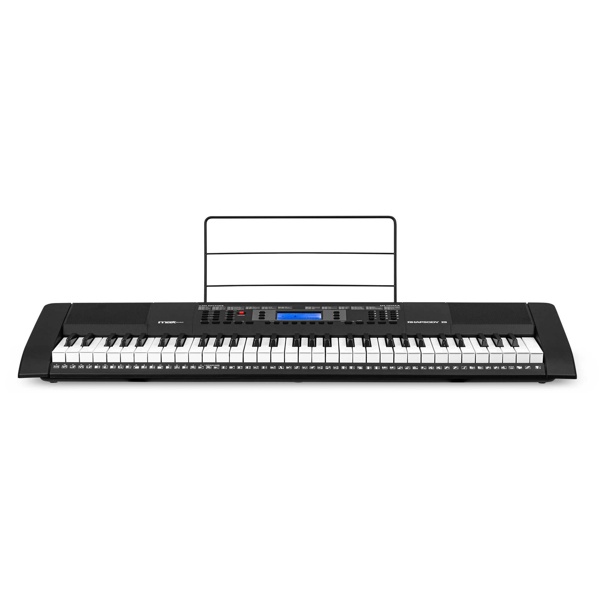 Un teclado electrónico negro con teclas blancas y un atril sobre un fondo blanco.