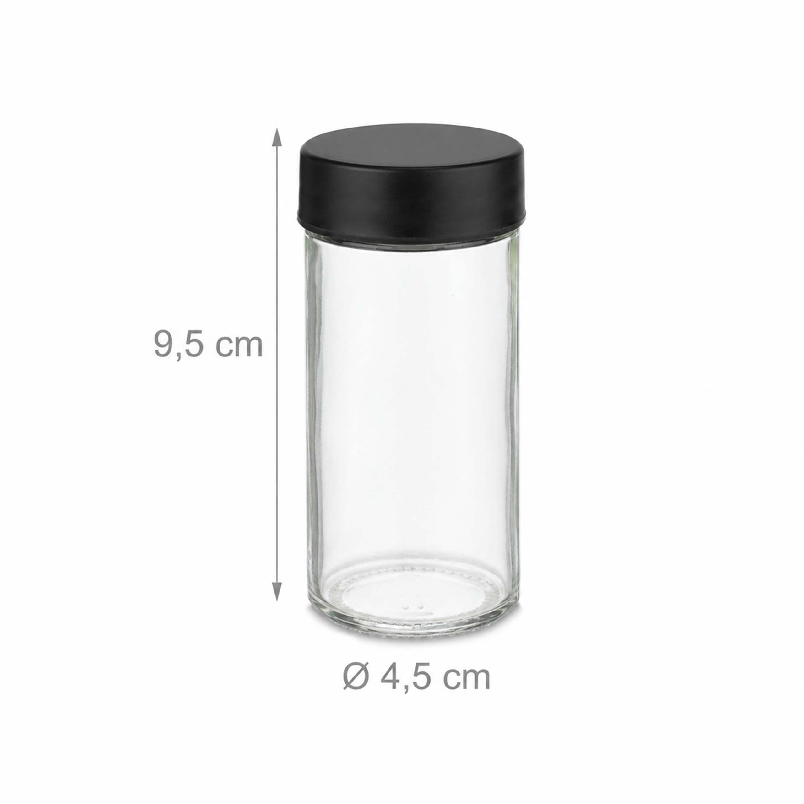 Ein durchsichtiges Glas mit schwarzem Deckel, 9,5 cm hoch und 4,5 cm im Durchmesser.