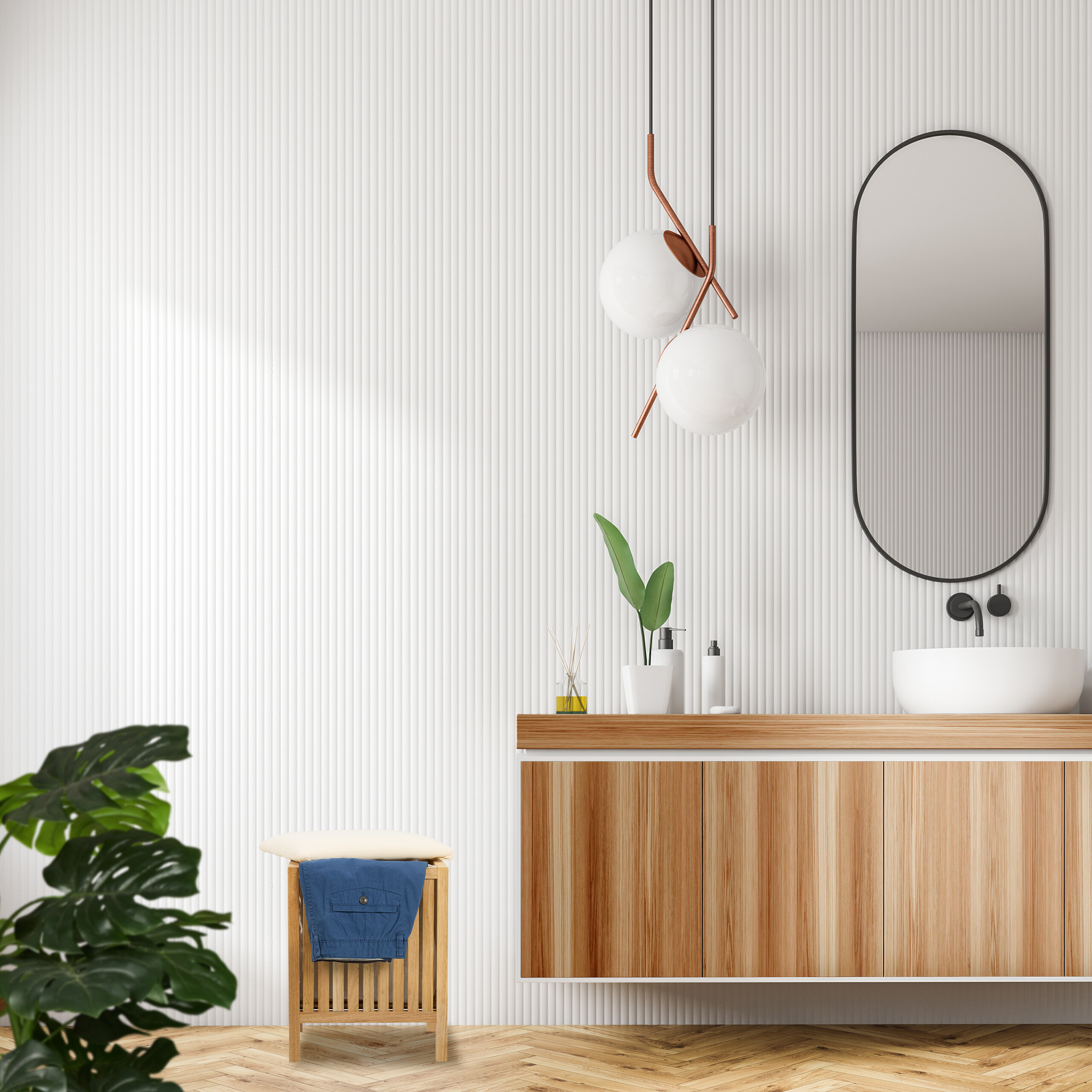 Ein modernes Badezimmer mit Holztisch, rundem Spiegel, Hängeleuchten und einer Pflanze im Vordergrund.