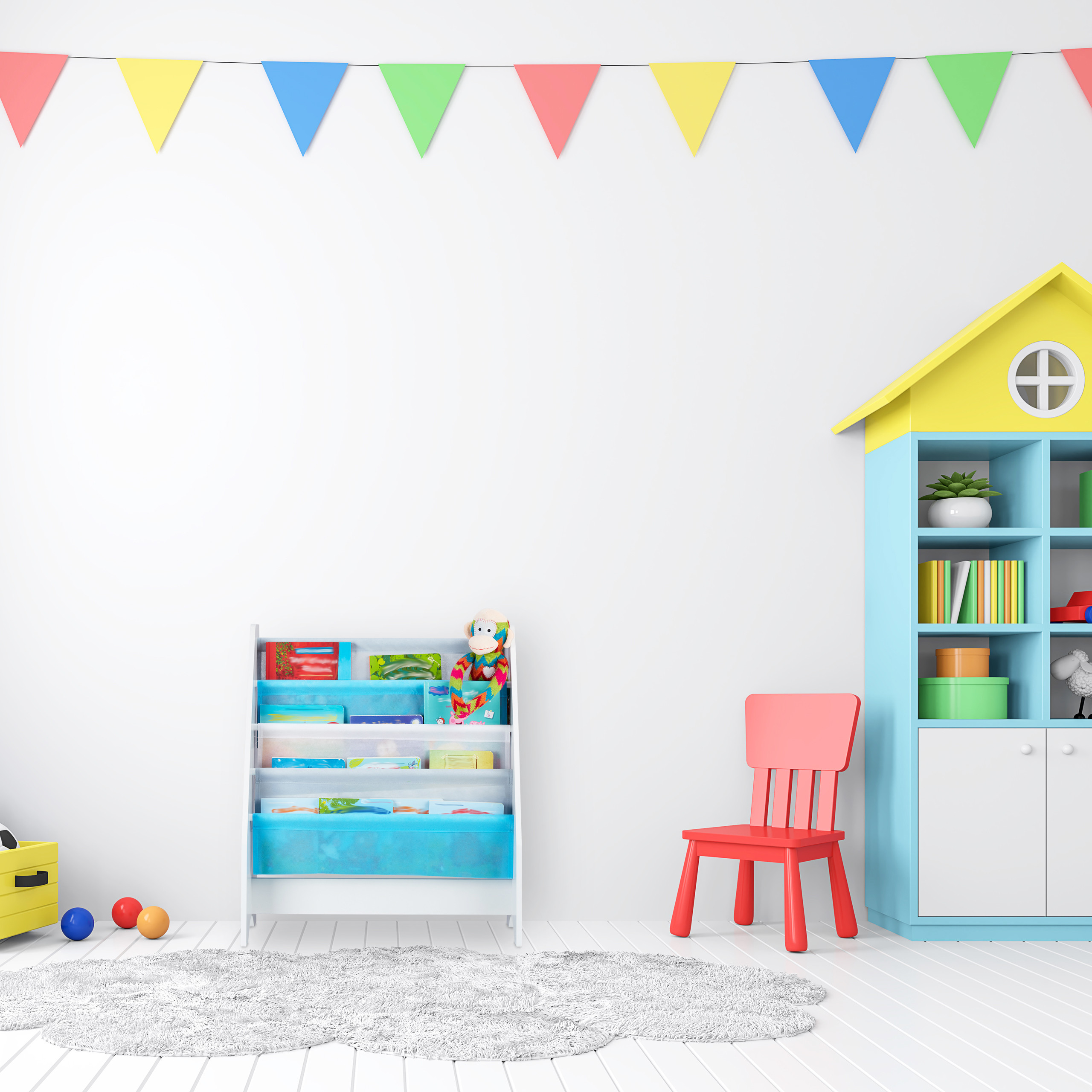 Buntes Kinderzimmer mit weißen Wänden, Spielzeugregal, rotem Stuhl, Bücherschrank und Wimpeln.