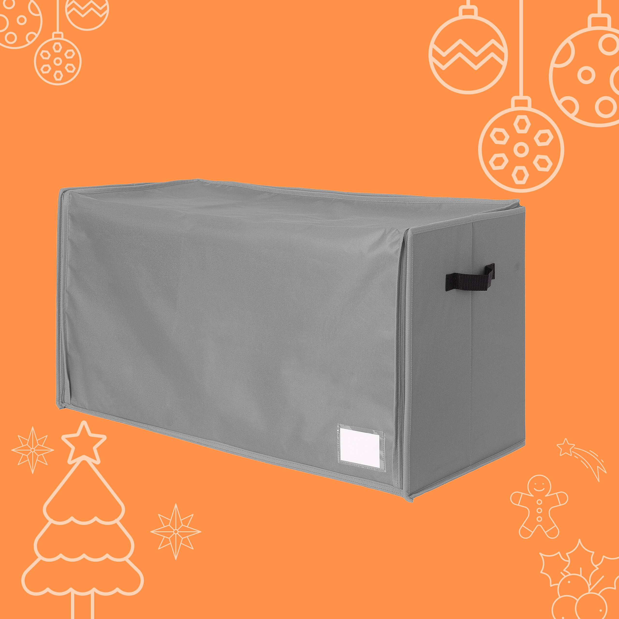 Eine graue Aufbewahrungsbox mit schwarzem Griff vor orangem Hintergrund mit Weihnachtsmotiven.
