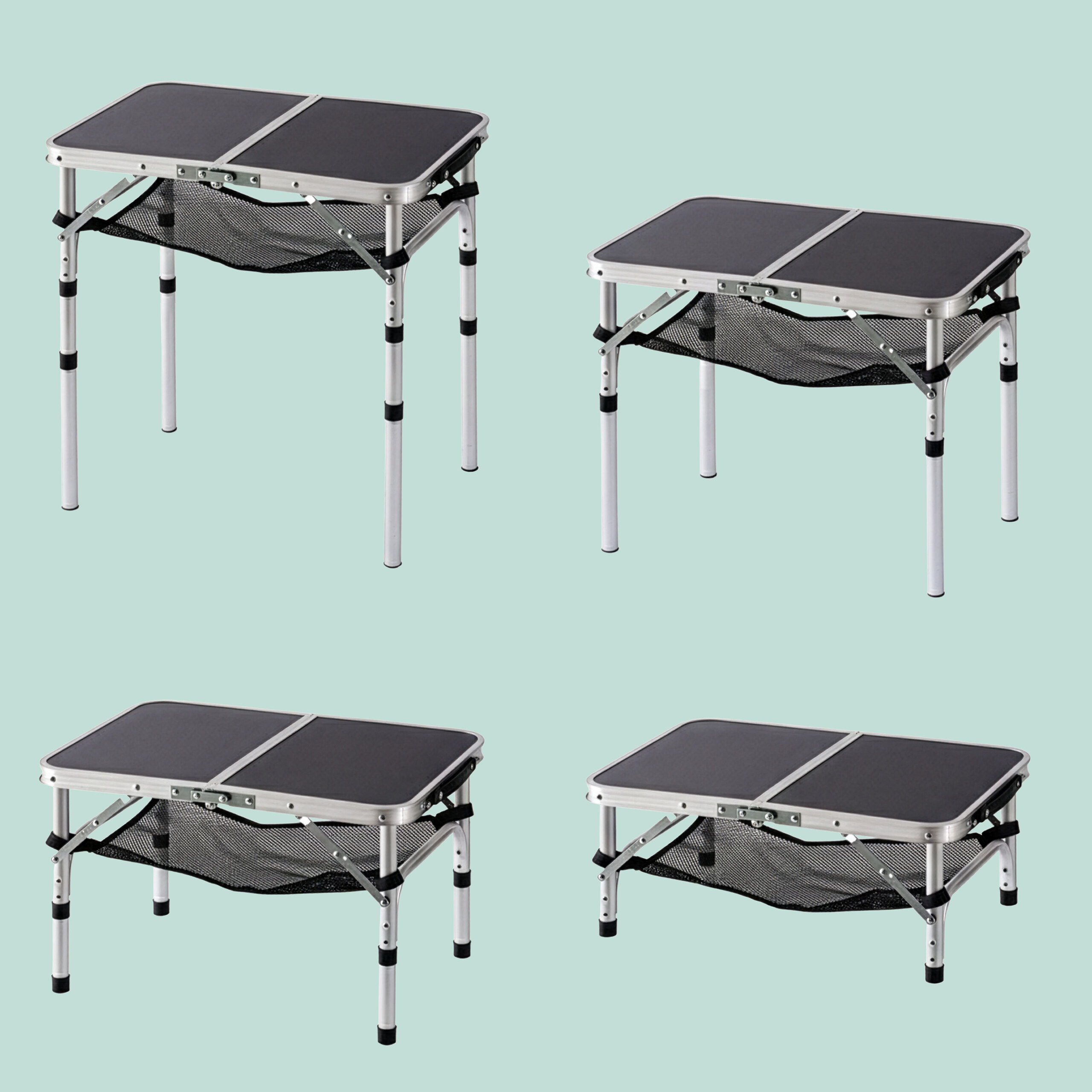 Vier Klapp-Camtische mit schwarzen Platten, silbernen Aluminiumbeinen und Netzablagen darunter.