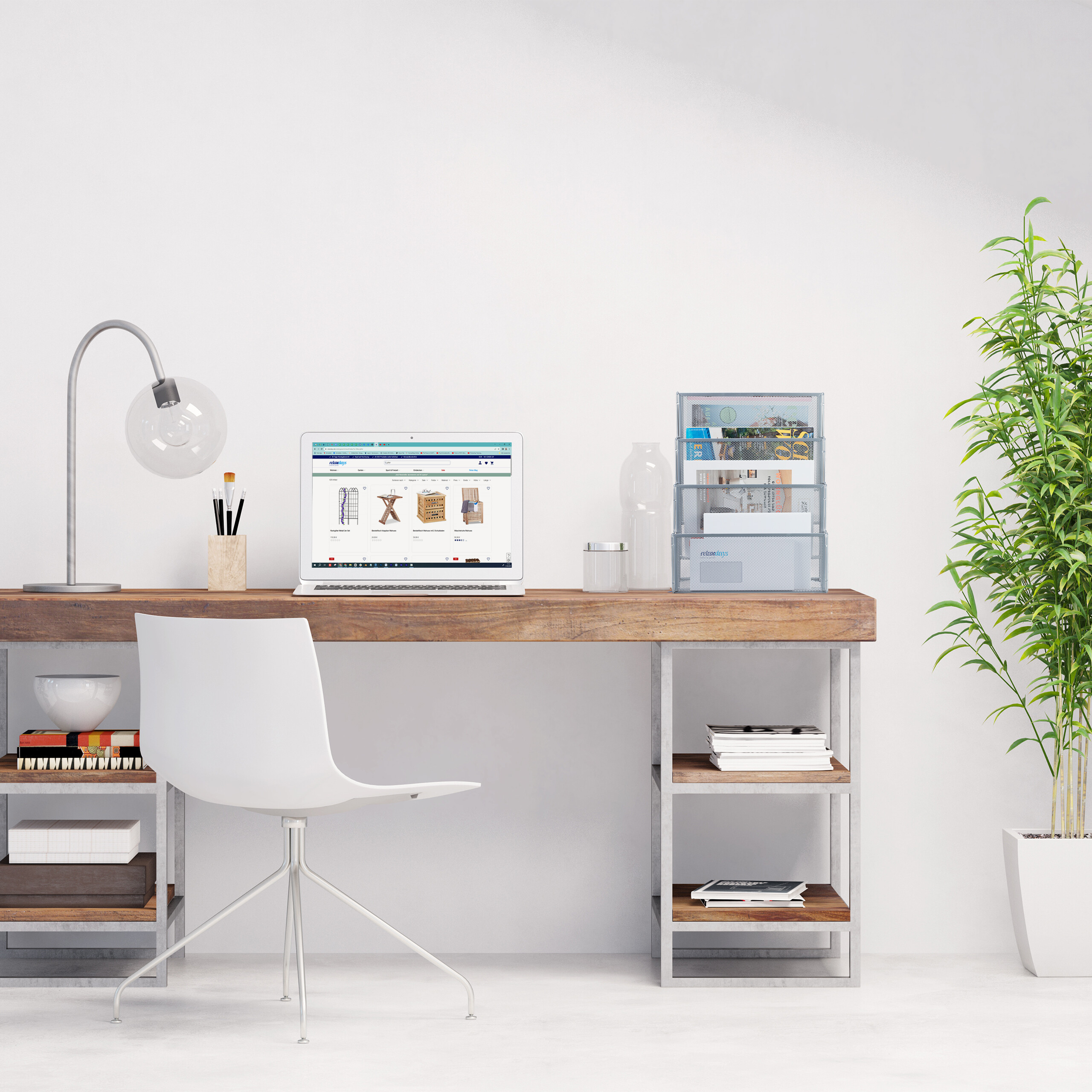 Moderne Schreibtischecke mit Laptop, Lampe, Organizer, Pflanzen und weißem Stuhl.