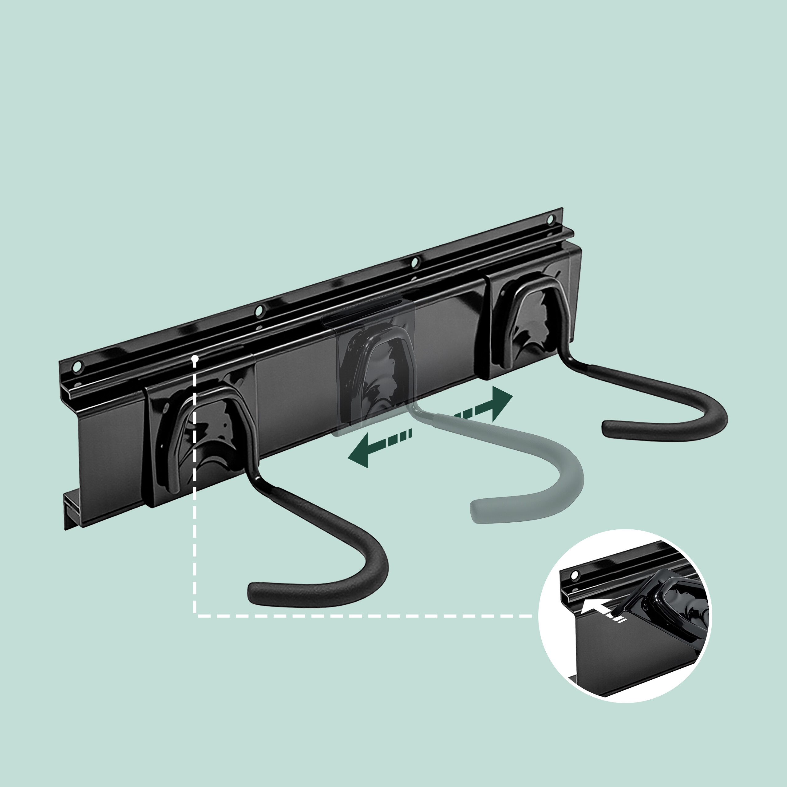 Eine schwarze Wandschiene aus Metall mit verstellbaren Haken zeigt deren horizontale Verschiebbarkeit.