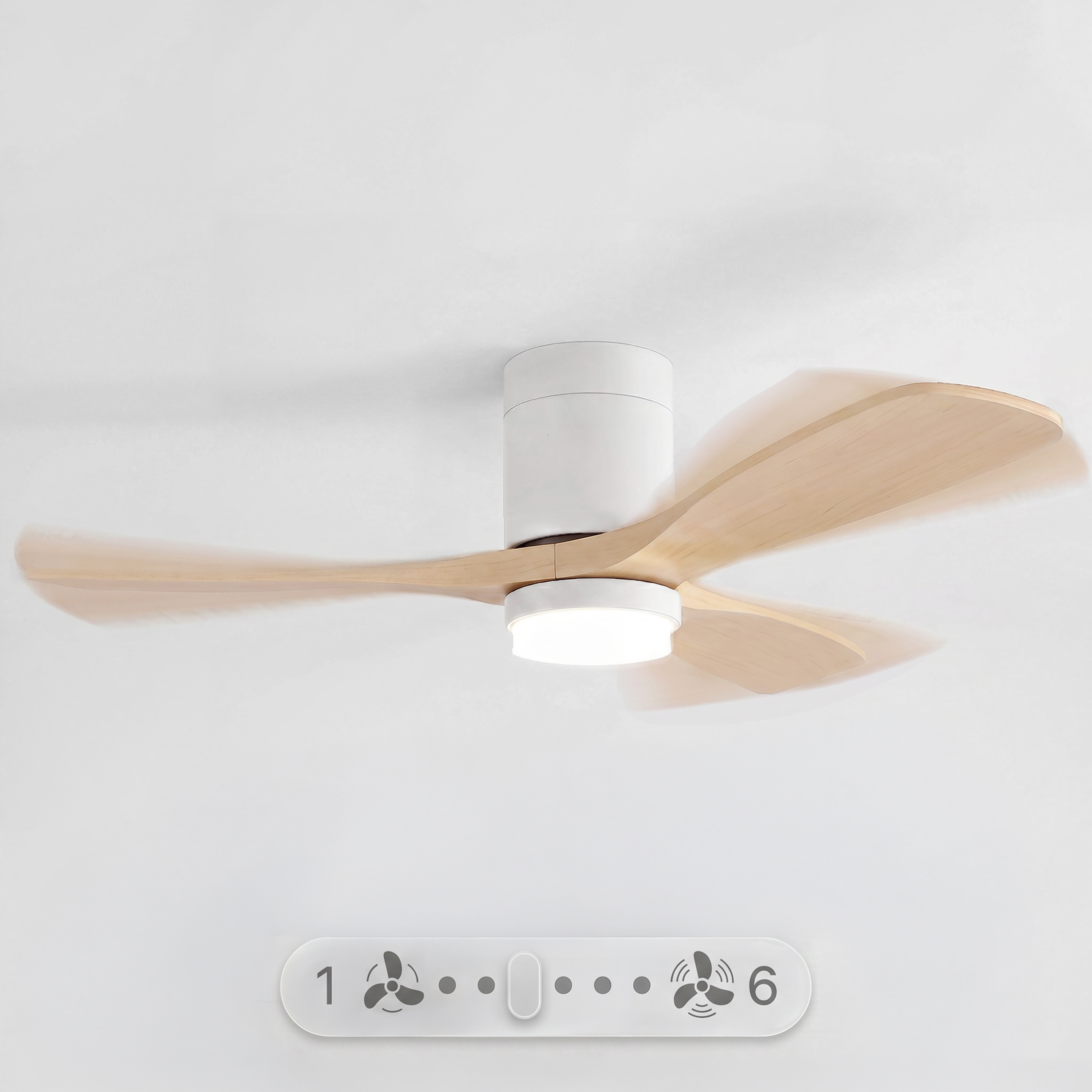 Un ventilador de techo blanco con aspas de madera y centro iluminado en un techo blanco, con un panel de control de velocidad abajo.