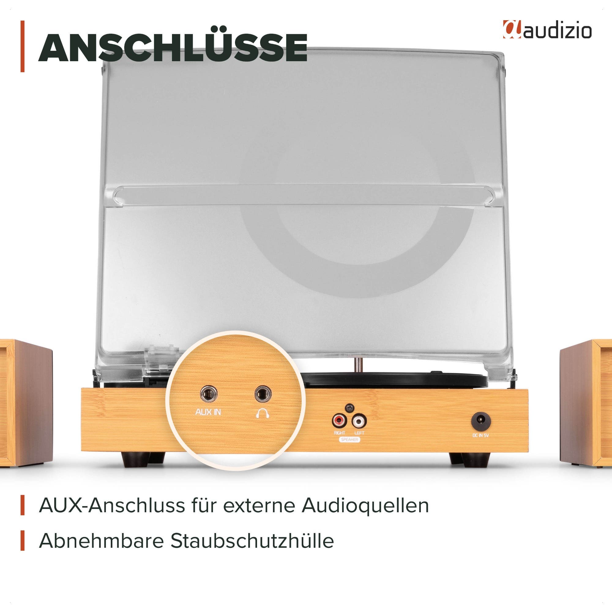 Un plato giradiscos de madera con cubierta antipolvo y vista ampliada de los conectores AUX y de auriculares.