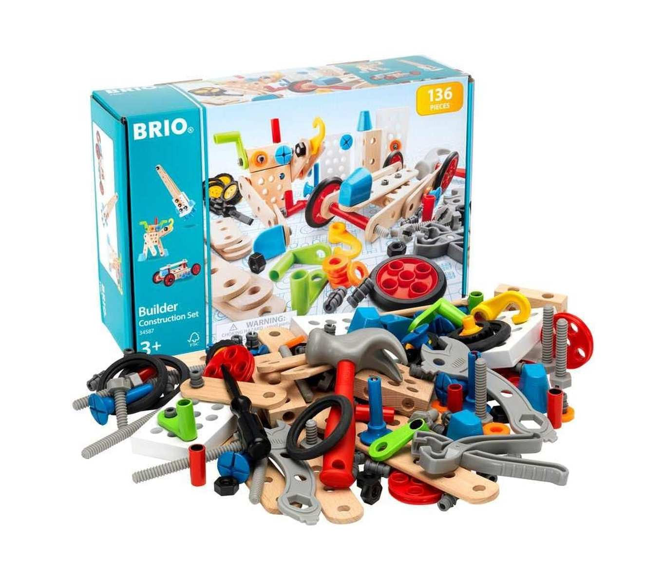 Caja de set de construcción Brio Builder con piezas de madera, herramientas y componentes coloridos delante sobre blanco.