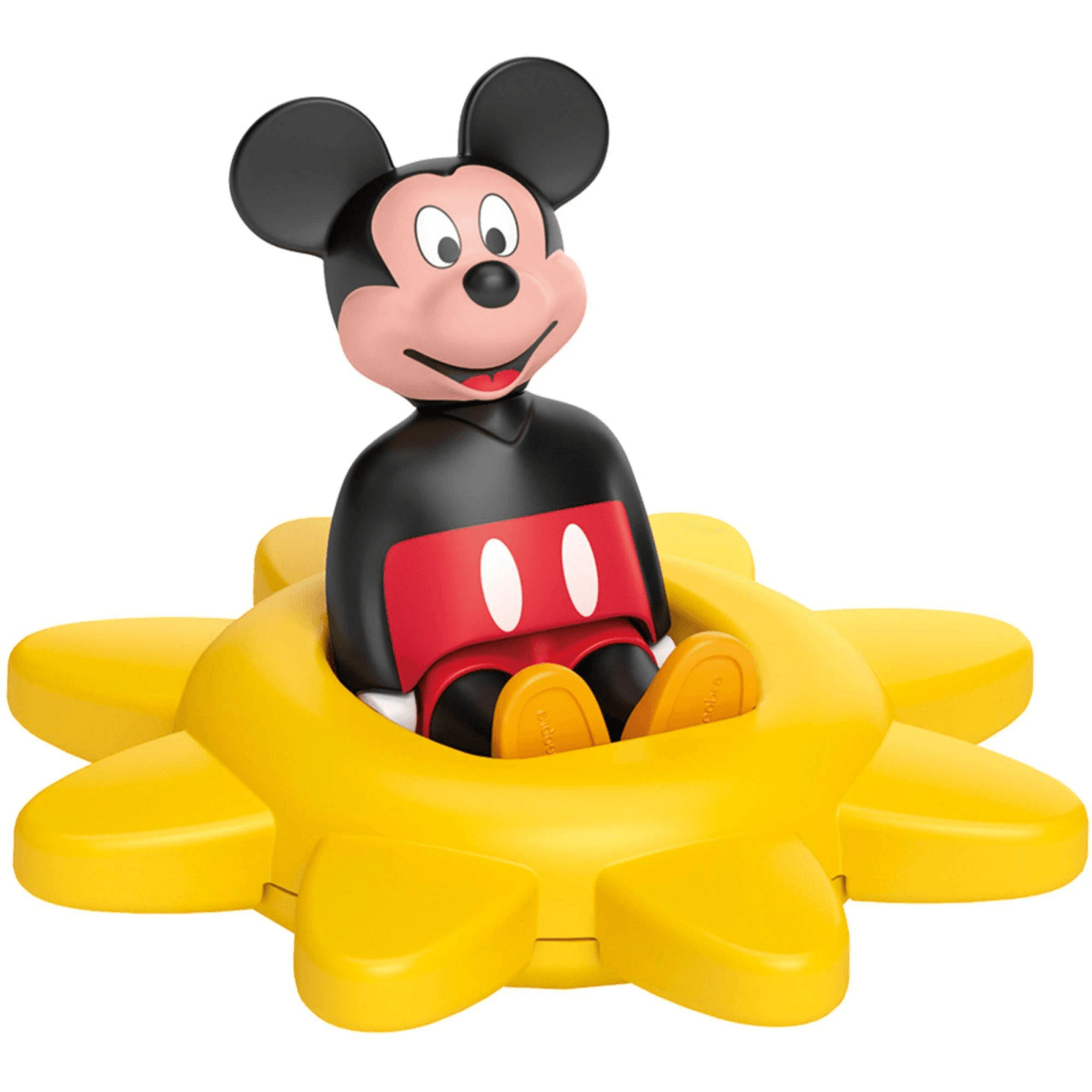 Mickey Mouse se sienta dentro de un juguete amarillo en forma de flor sobre fondo blanco.